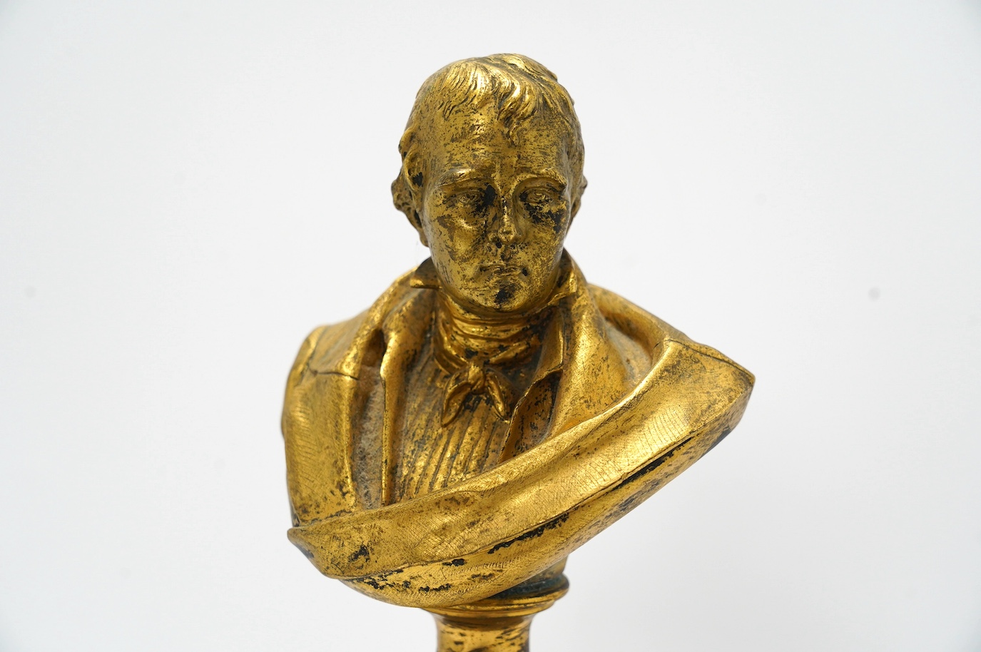 An early 20th century gilt metal bust of Sir Walter Scott on pedestal, 34cm. Condition - fair to good